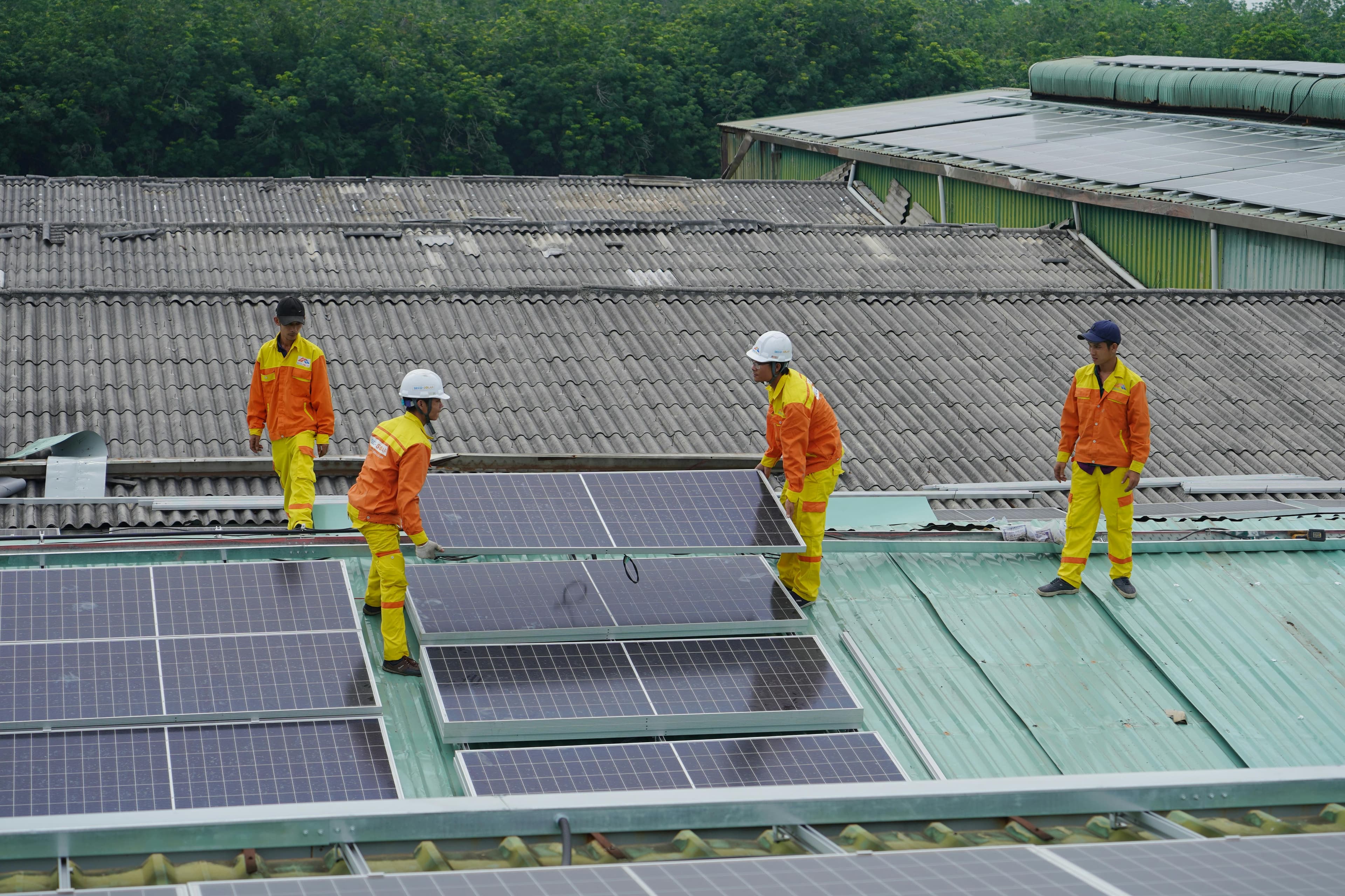 Solar panels on a home roof with clear sky